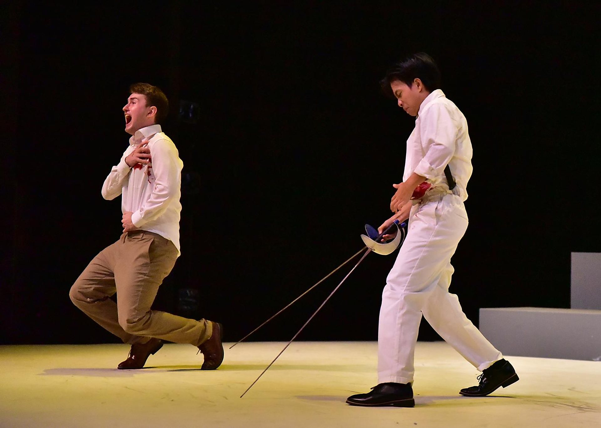 Laertes, wounded, recoils from the duel