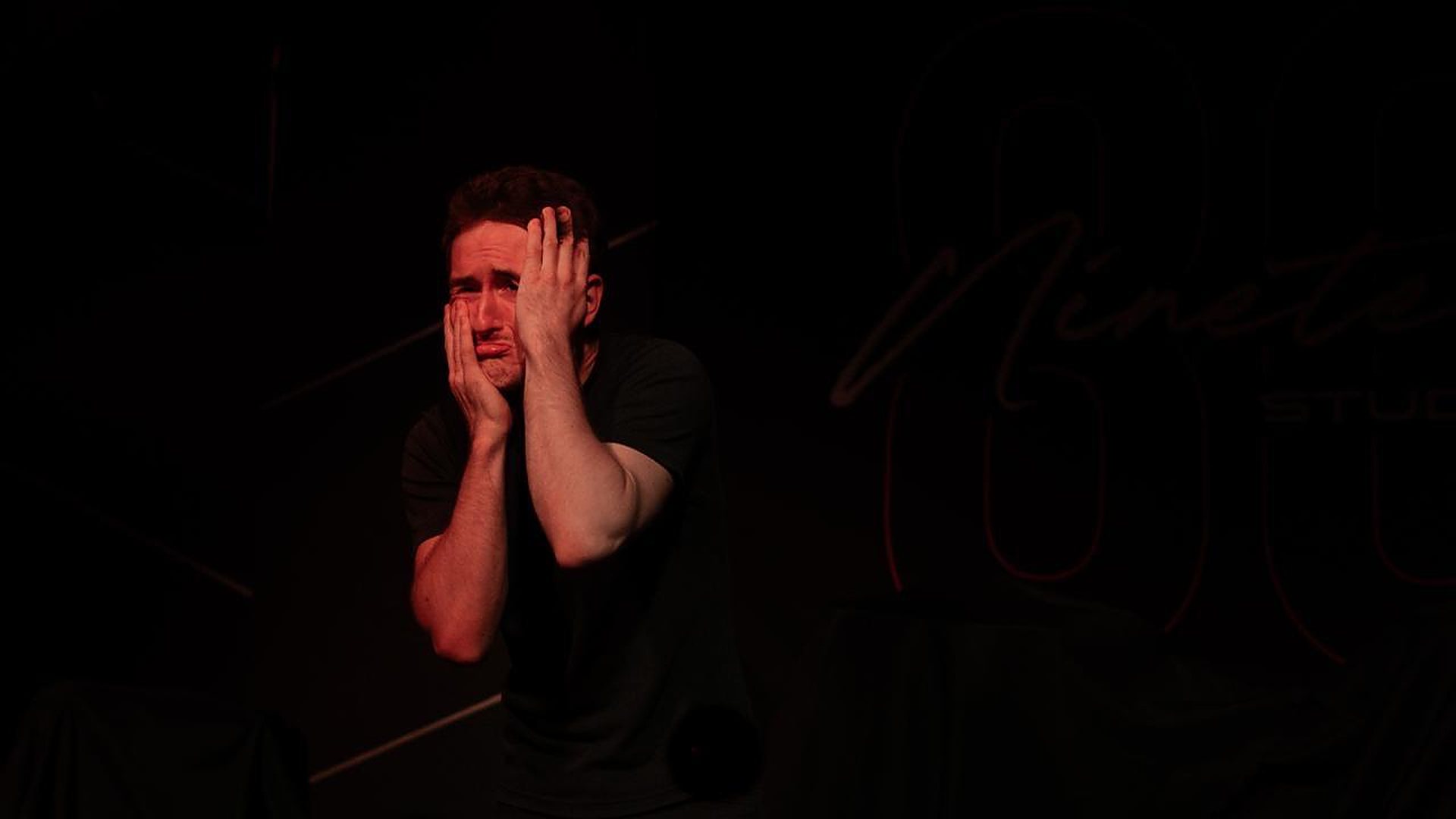 Andrei with his face in his hands in Unbecoming